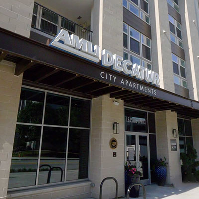 Image of the AMLI Decatur building with the Atlanta skyline