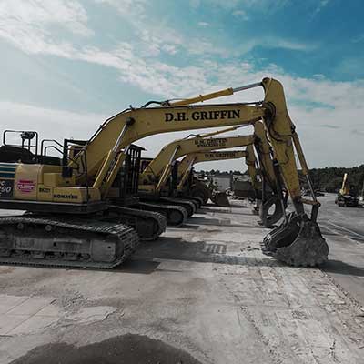 Image of a row of excavators