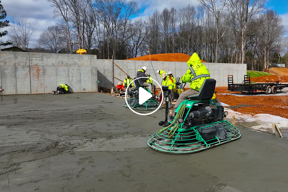 Image of workers on machine trowels