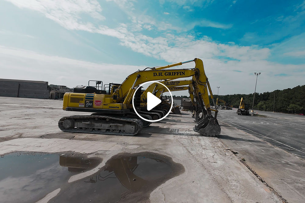 Image of excavators lined up